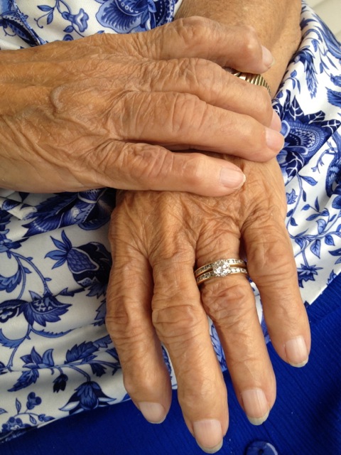 My grandmother's hands, and her blue muumuu. 2012.