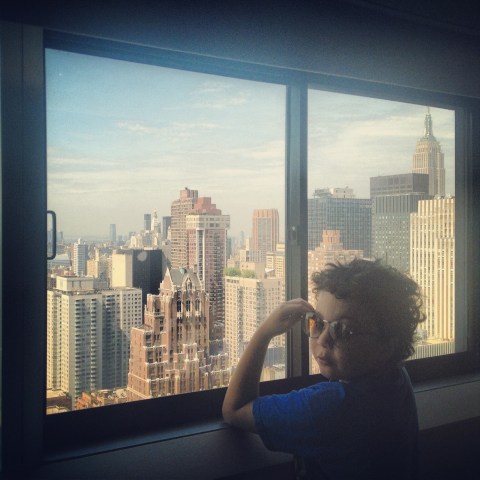August (wearing vintage sunglasses) in NYC. Our room, One UN, 2013.