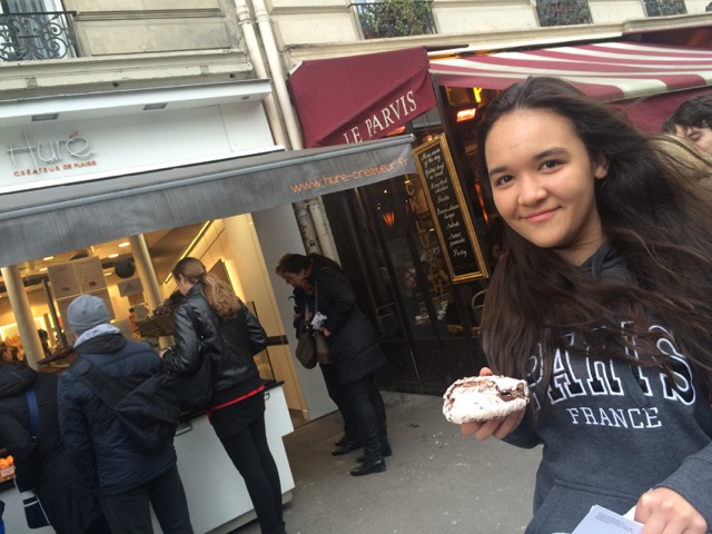 Royal with a double chocolate merengue, that I, of course, prompted her to buy at Hure on Rue d'Arcole.