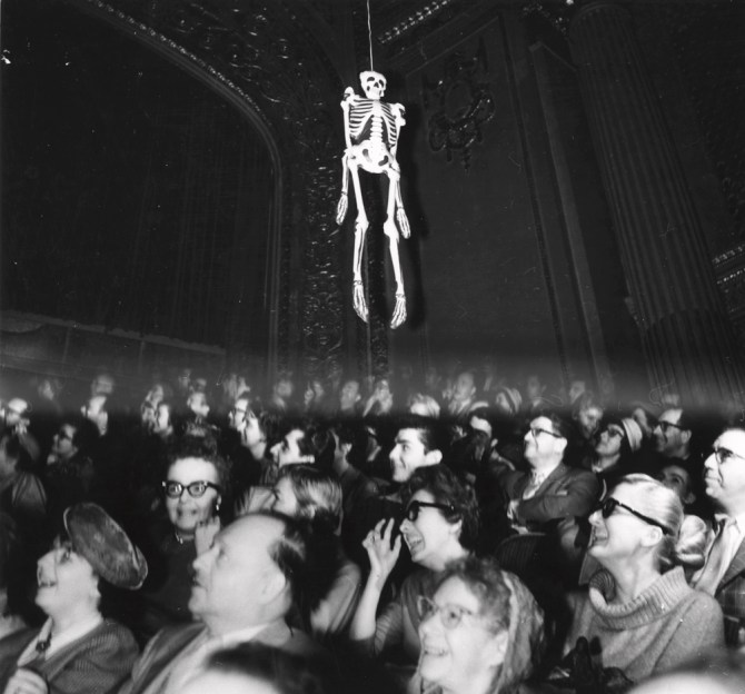 Skeleotn over audience weegee_.jpg