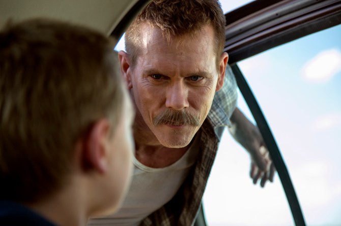 Sheriff Kretzer (Kevin Bacon) stares down Travis (James Freedson-Jackson in Cop Car. Courtesy of Focus Features.