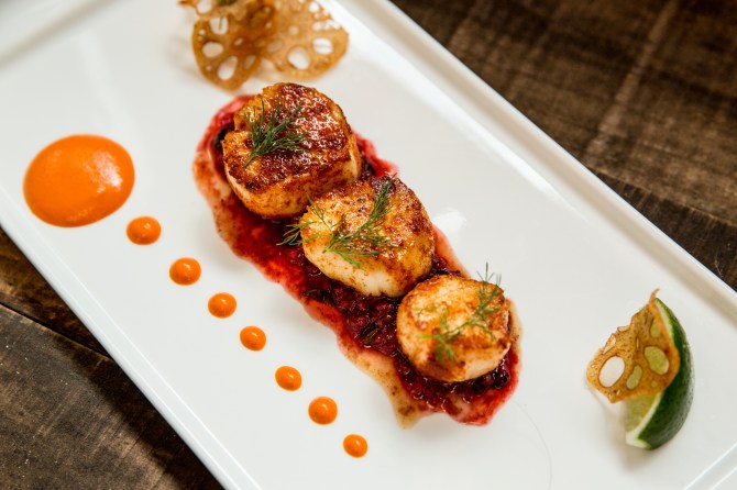 Seared Scallops w/roasted pepper chutney, lotus root, mixed berry & chile relish. Photo Credit: Aubrie Pick