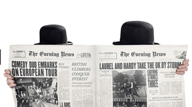 Stan & Ollie newspaper reading.png