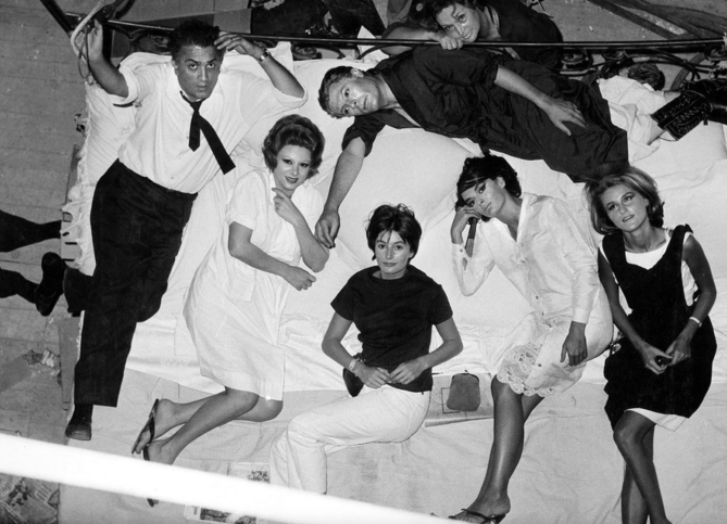 Fellini and cast on the floor.png