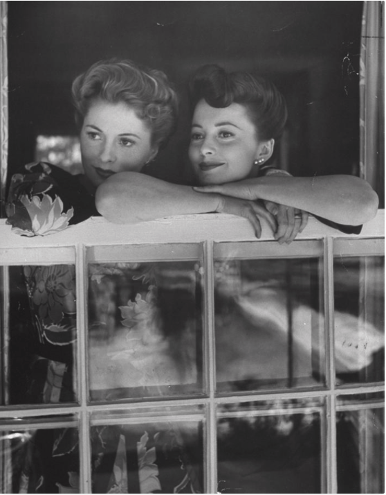 joan and Ol at window.png